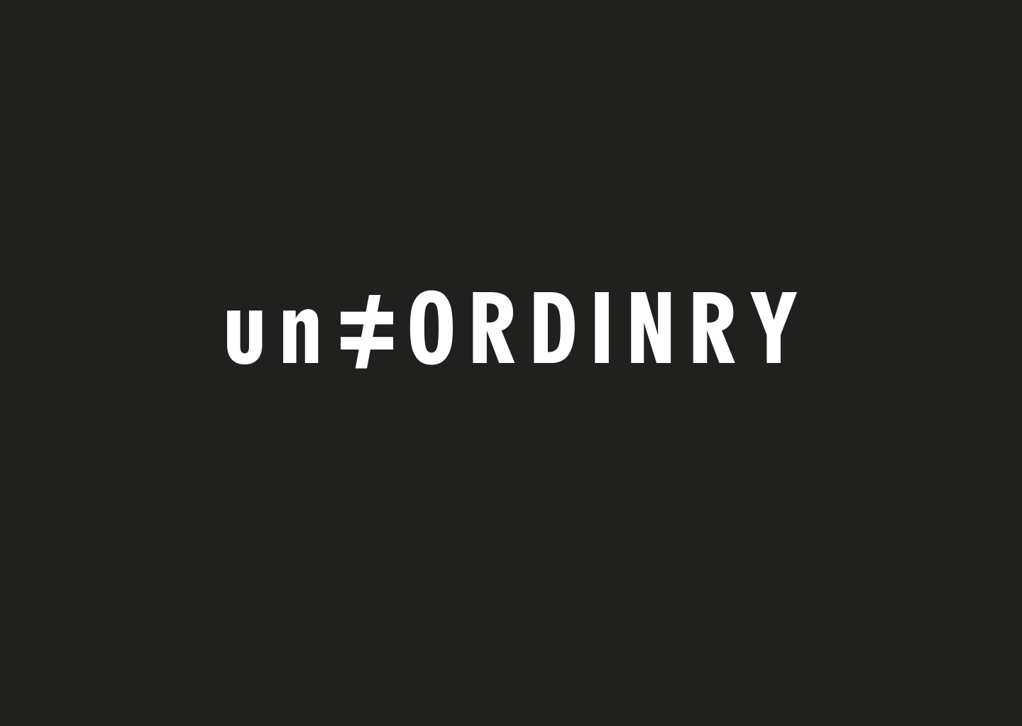 un≠ORDINRY full wordmark lockup on black